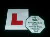 L-Plate and DSA ADI Badge - forms part of vehicle livery.